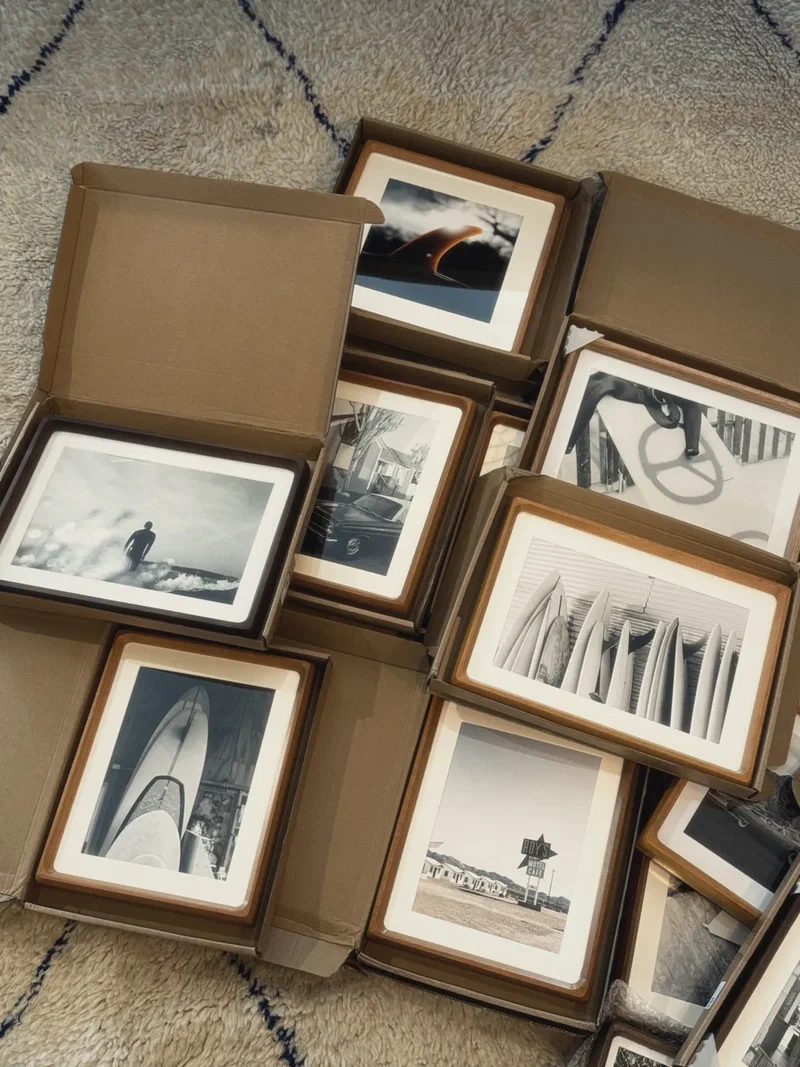 Framed photo prints packed in boxes