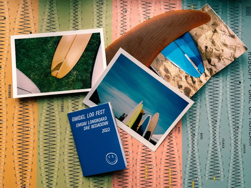 Gwidel Log Fest zine with prints and a wooden fin